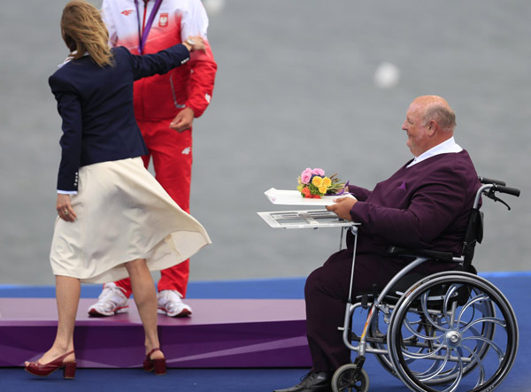 A very special medal and flower bearer