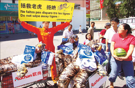 Greenpeace protests against company 'wiping out' tigers