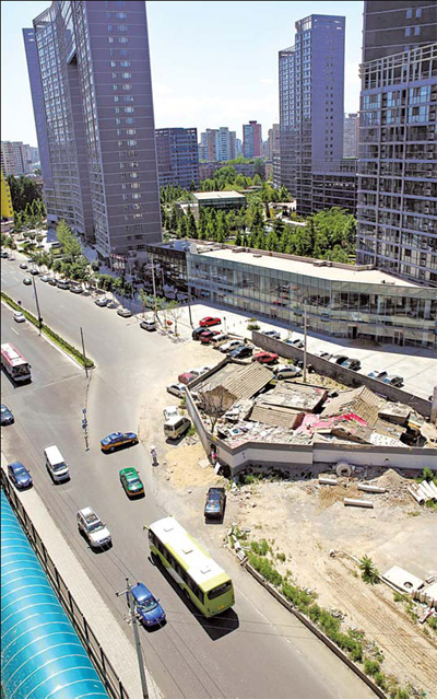 Traffic slowed to a crawl - by old houses