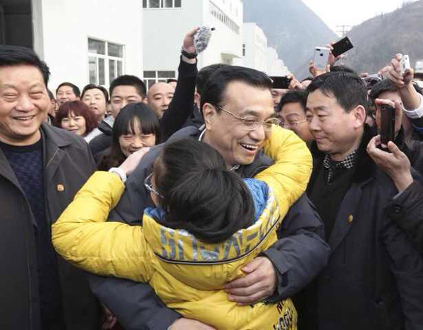 Li reaffirms commitment to social welfare system