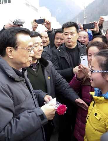 Li reaffirms commitment to social welfare system