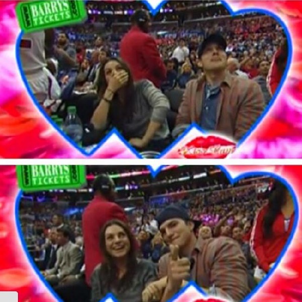 Ashton Kutcher and Mila Kunis caught on Kiss Cam