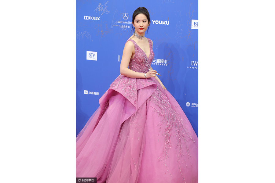 Pink goes well with the red carpet