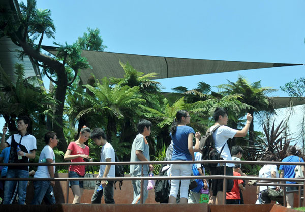 Visitors cool off at Expo Garden