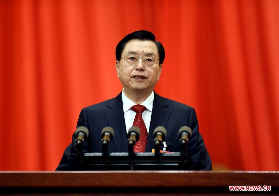 China's top legislator delivers work report