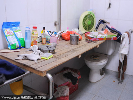 Migrant workers dwelling in public restroom