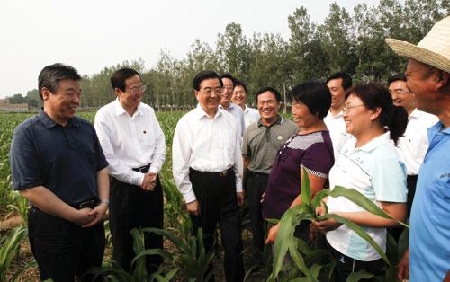 Hu urges economic restructuring, agricultural production