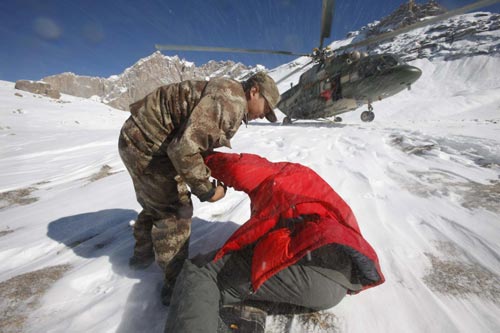 Three engineers rescued from China mountain blizzard