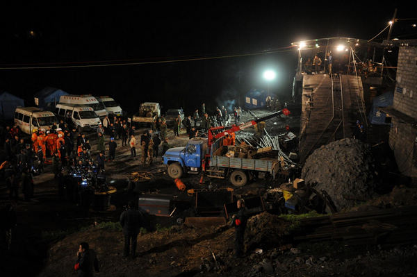 11 trapped in flooded colliery in SW China