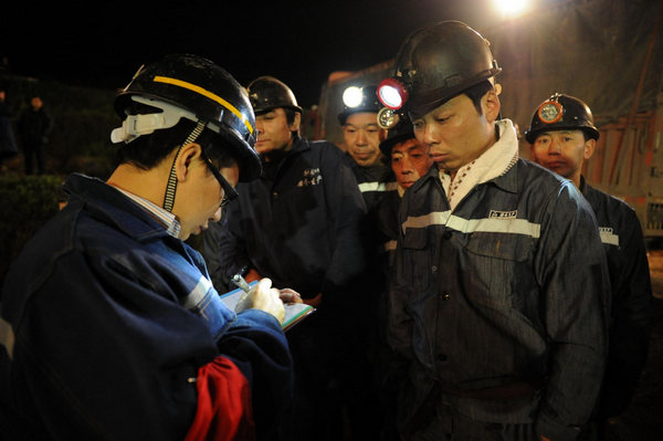 11 trapped in flooded colliery in SW China