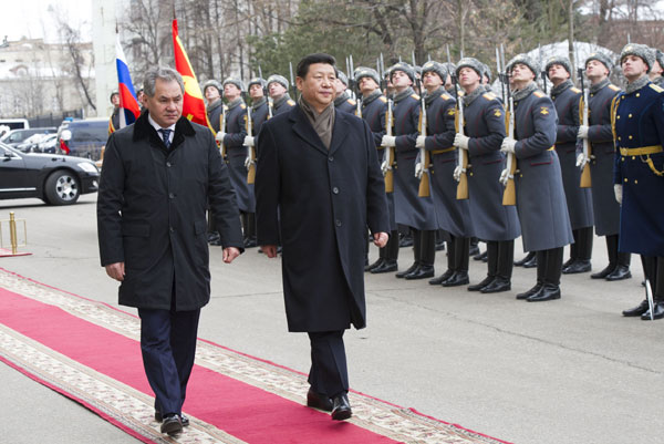 Xi hopes China, Russia to boost military ties