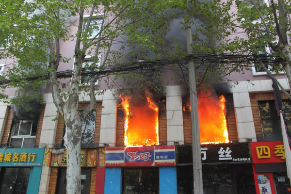 Central China hotel fire kills 11