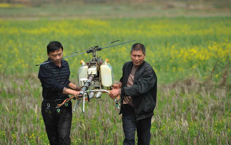 Farmer builds own drones to spray crops