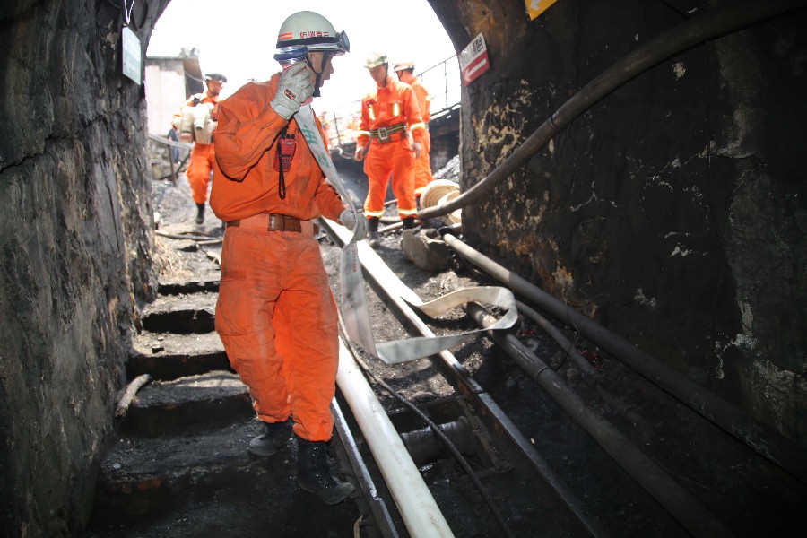 22 trapped in SW China mine flood