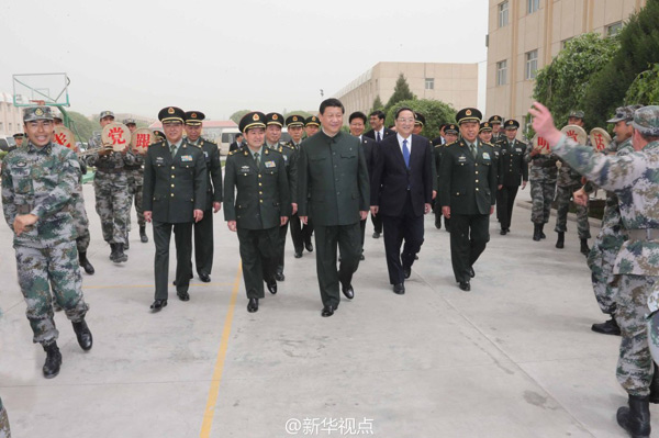 Xi visits border soldiers at Xinjiang base