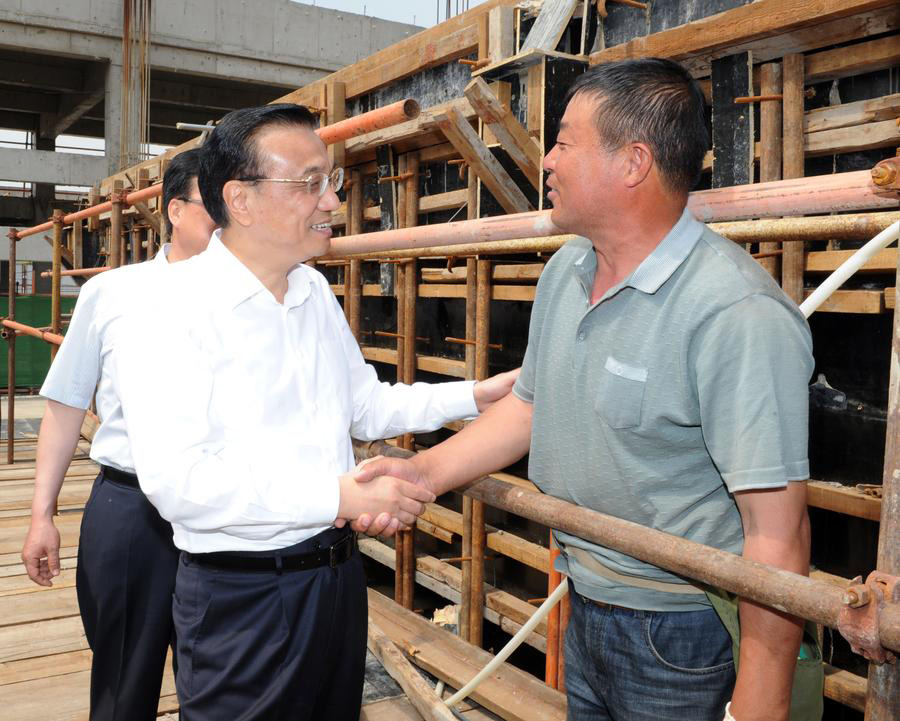 Premier Li urges sustainable development, better livelihood