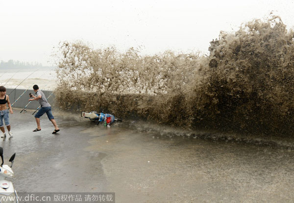 Qiantang river tide drenches spectators