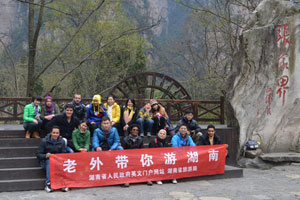 Bikini mud-wrestling boosts travel to scenic Central China