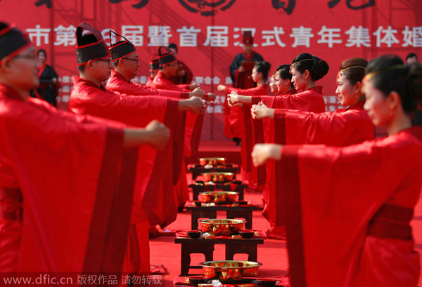 Couples tie the knot in traditional group wedding