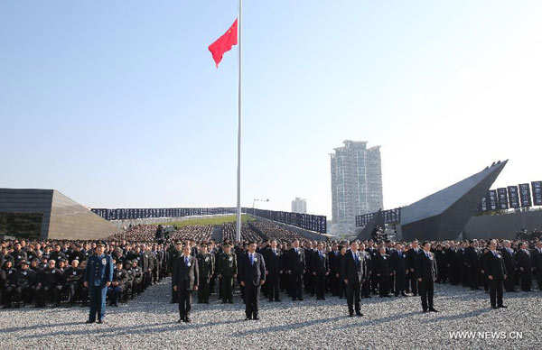 Memorial service for Nanjing Massacre victims gains global media attention