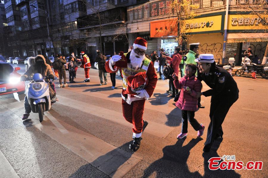 Santa traffic policemen add festivity to the streets