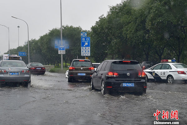 Beijing issues yellow alert for rainstorms