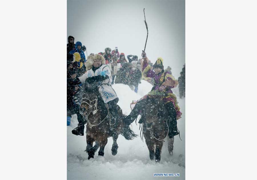 Snow brings fun to Xinjiang village