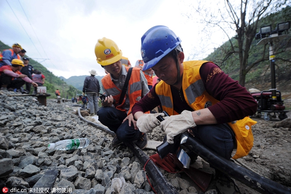 Landslide-disrupted railway service resumes in SW China