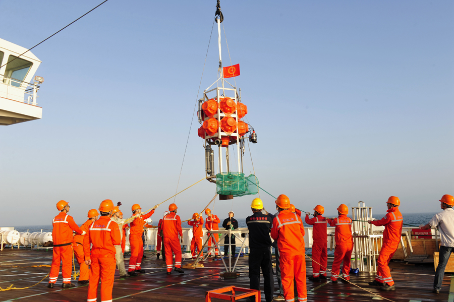 Staff practice submersible Rainbow Fish on research vessel in S. China Sea