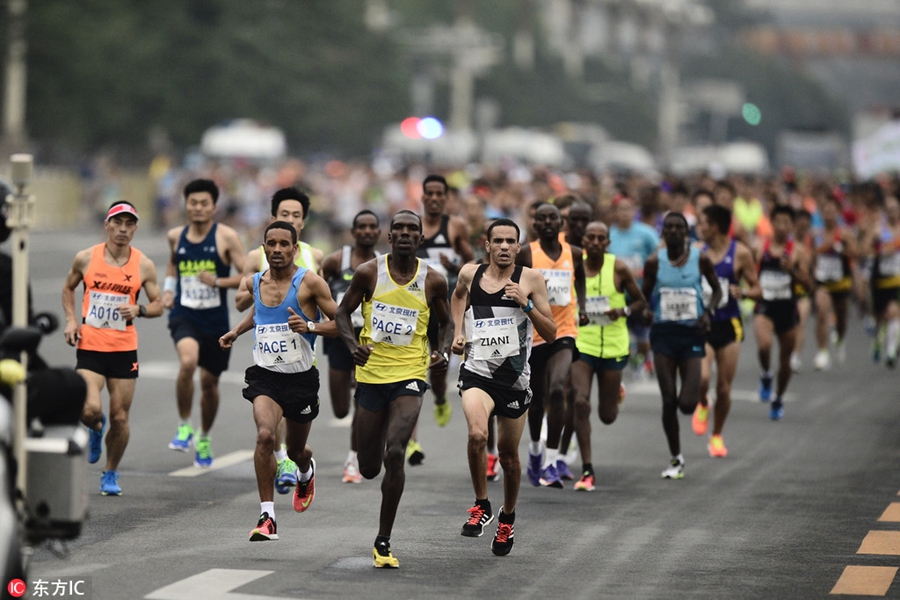 Runners compete during Beijing marathon