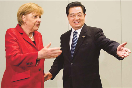 Hu, Merkel vow to further ties