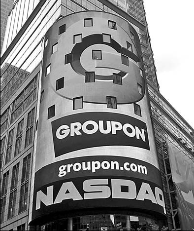 Groupon Inc tests new credit card reader