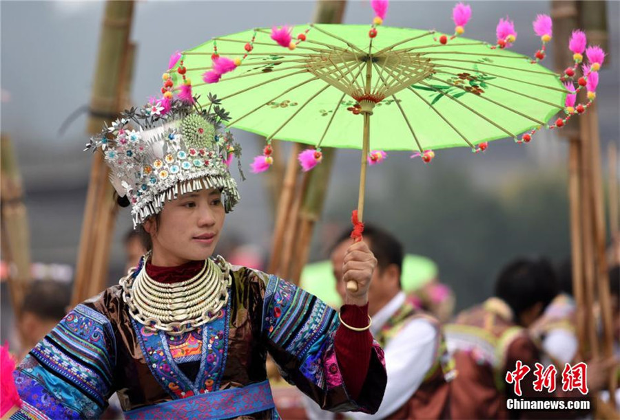 600 people attend Lusheng playing contest in S China