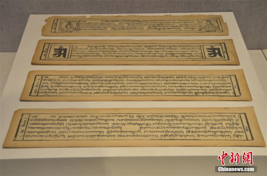 Rare ancient manuscripts of Chinese ethnic groups on display in Xinjiang