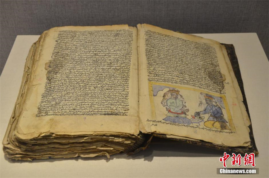 Rare ancient manuscripts of Chinese ethnic groups on display in Xinjiang