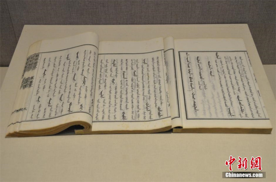 Rare ancient manuscripts of Chinese ethnic groups on display in Xinjiang