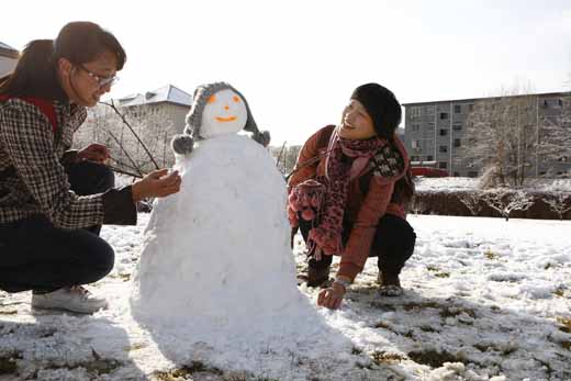 组图：三月降春雪 素裹银装扮靓京城