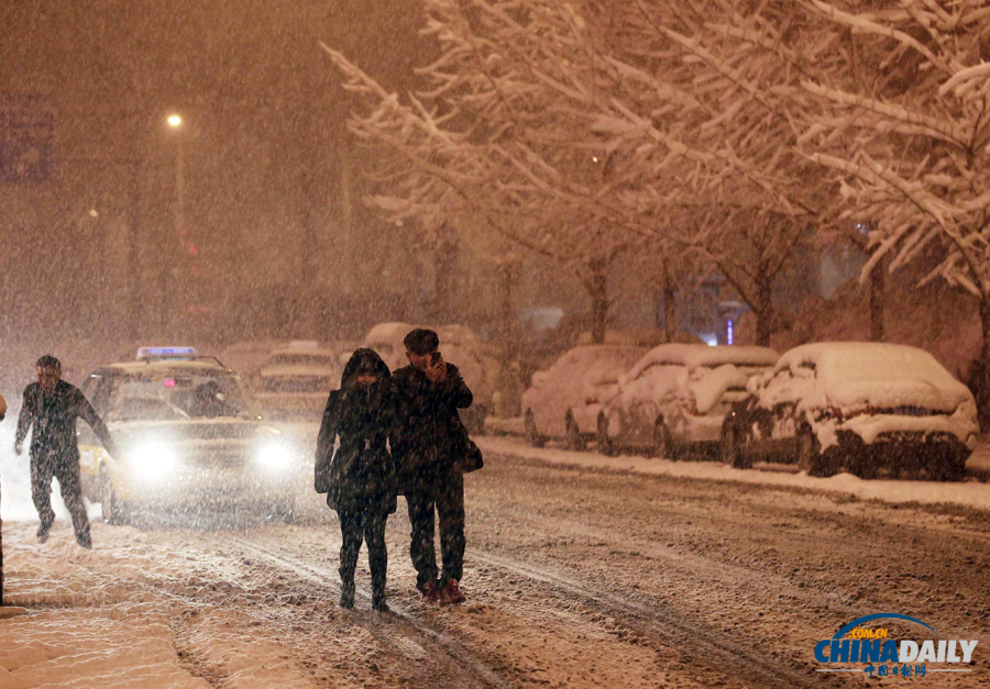 中国日报直击北京三月春雪