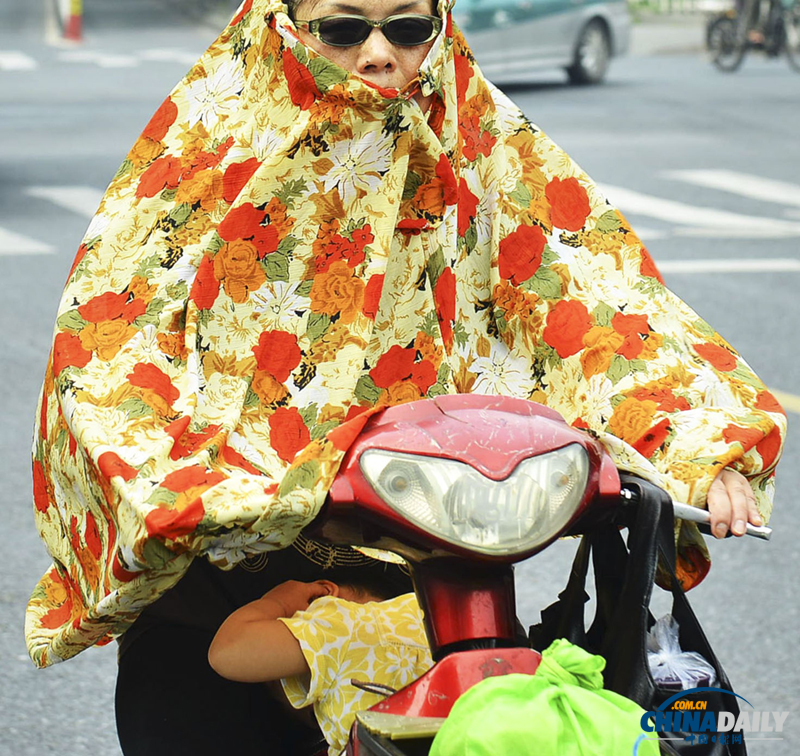 中国日报聚焦全国多地高温天气