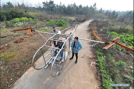 Farmer dreams of making his own helicopeter in Ganzhou Village in Miluo City