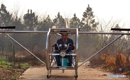 Farmer dreams of making his own helicopeter in Ganzhou Village in Miluo City