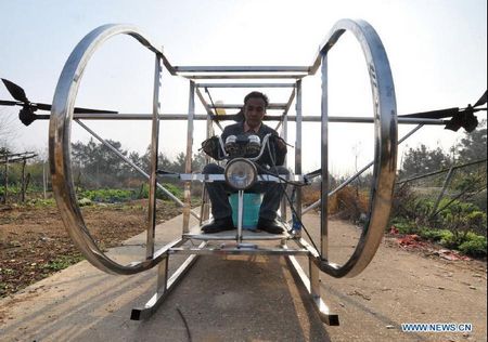 Farmer dreams of making his own helicopeter in Ganzhou Village in Miluo City