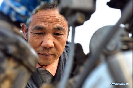 Farmer dreams of making his own helicopeter in Ganzhou Village in Miluo City