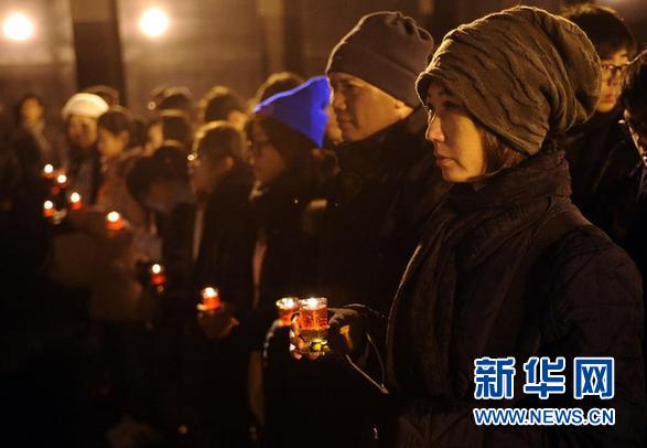 南京为大屠杀遇难者举行“和平烛光祭”（图）