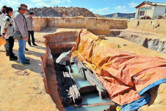 云南祥云发现大规模战国墓葬群 被列入2014年度国内6大考古发现