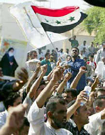 Iraqi Shi'ite protesters march on US HQ