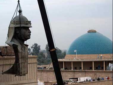 Giant Saddam bust dismantled