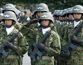 Japan approves disputed troops-for-Iraq plan