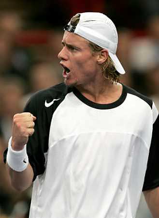 Lleyton Hewitt of Australia reacts during his match against Gael Monfils of France in the Paris Masters Series ATP tennis tournament, November 2, 2004. Hewitt defeated Monfils 6-3 7-6. [Reuters]