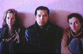 Annetta Flanigan of Northern Ireland, left, Filipino diplomat Angelito Nayan, center, and Shqipe Habibi of Kosovo, right, seen in this video released by militant, Sunday, Oct.31, 2004. Militants released a video Sunday showing three frightened foreign U.N. hostages pleading for their release, and threatened to kill them unless United Nations' and British troops leave Afghanistan and Muslim prisoners are freed from U.S. jails. [AP] 